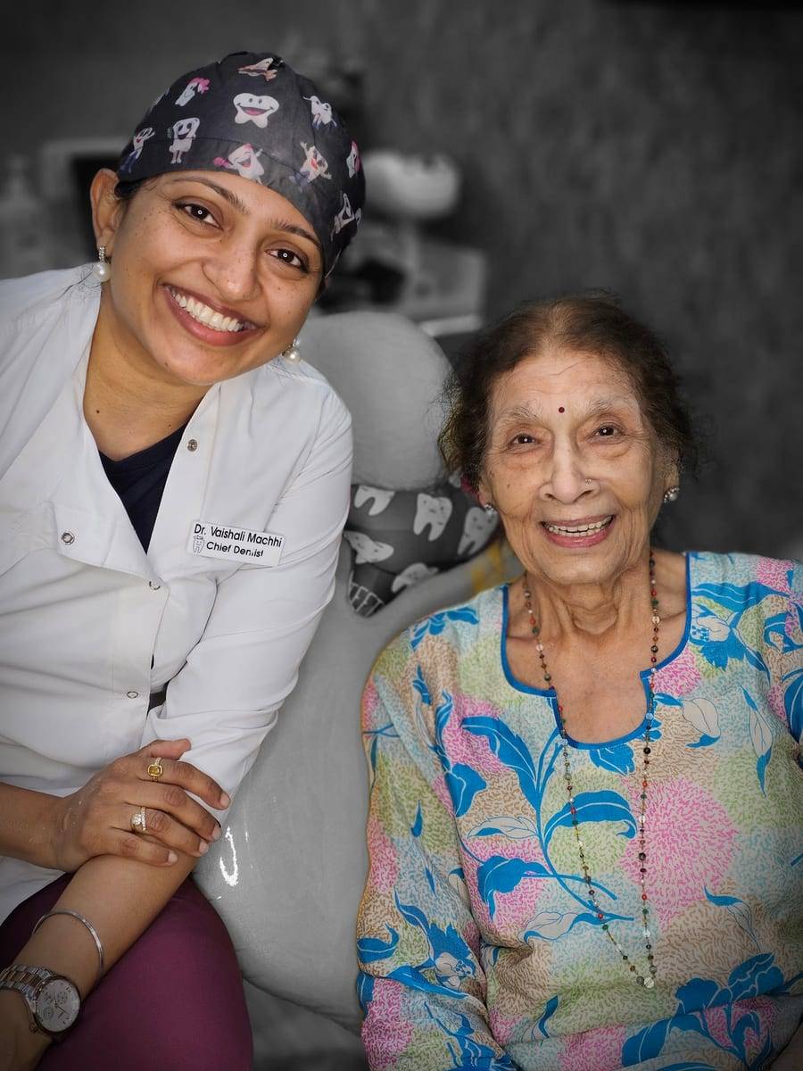 A smiling patient with Dr. Vaishali at Make Me Smile