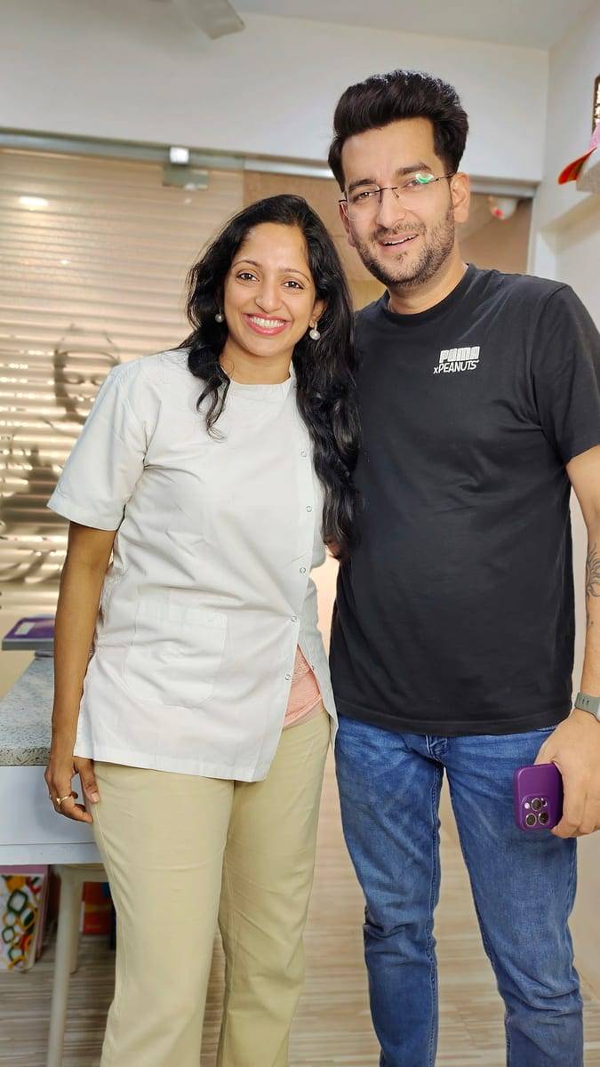 A smiling patient with Dr. Vaishali at Make Me Smile