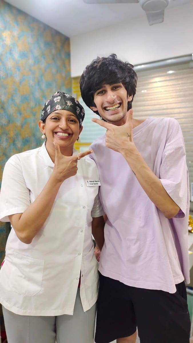 A smiling patient with Dr. Vaishali at Make Me Smile