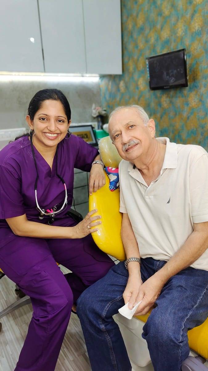 A smiling patient with Dr. Vaishali at Make Me Smile