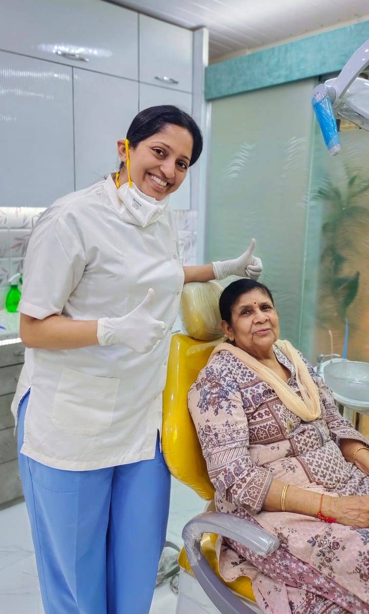 A smiling patient with Dr. Vaishali at Make Me Smile