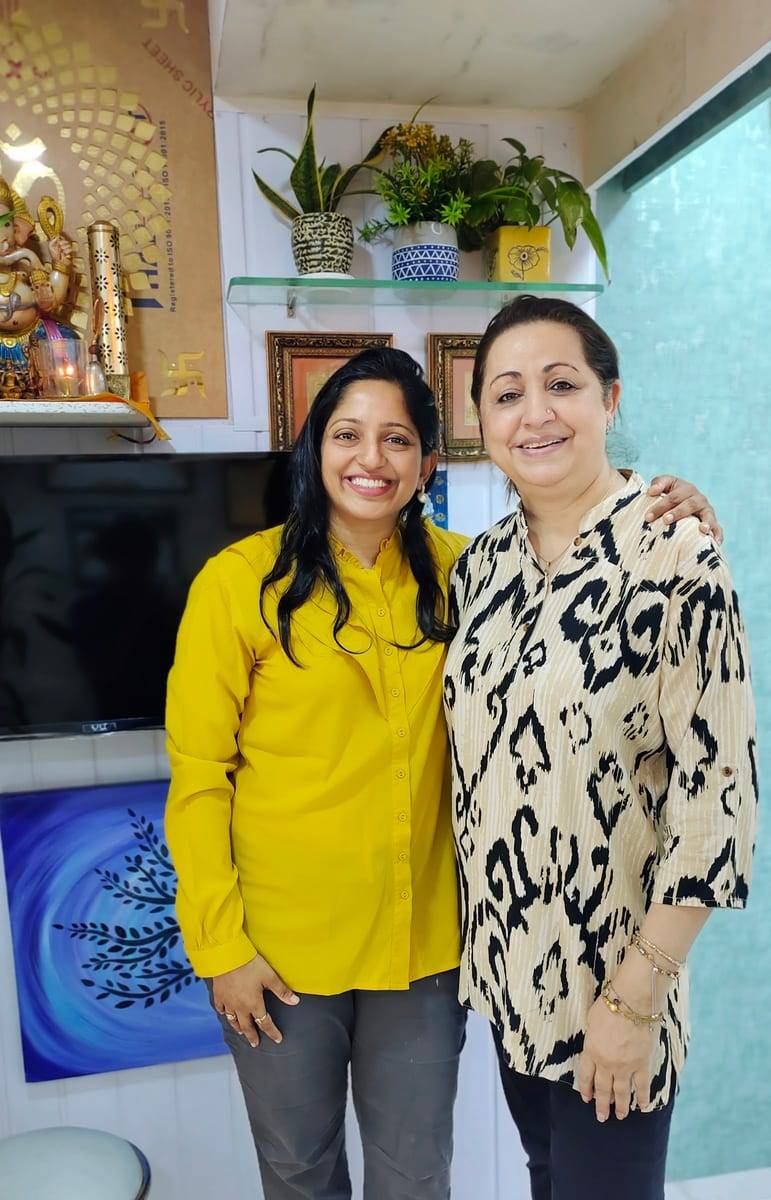 A smiling patient with Dr. Vaishali at Make Me Smile