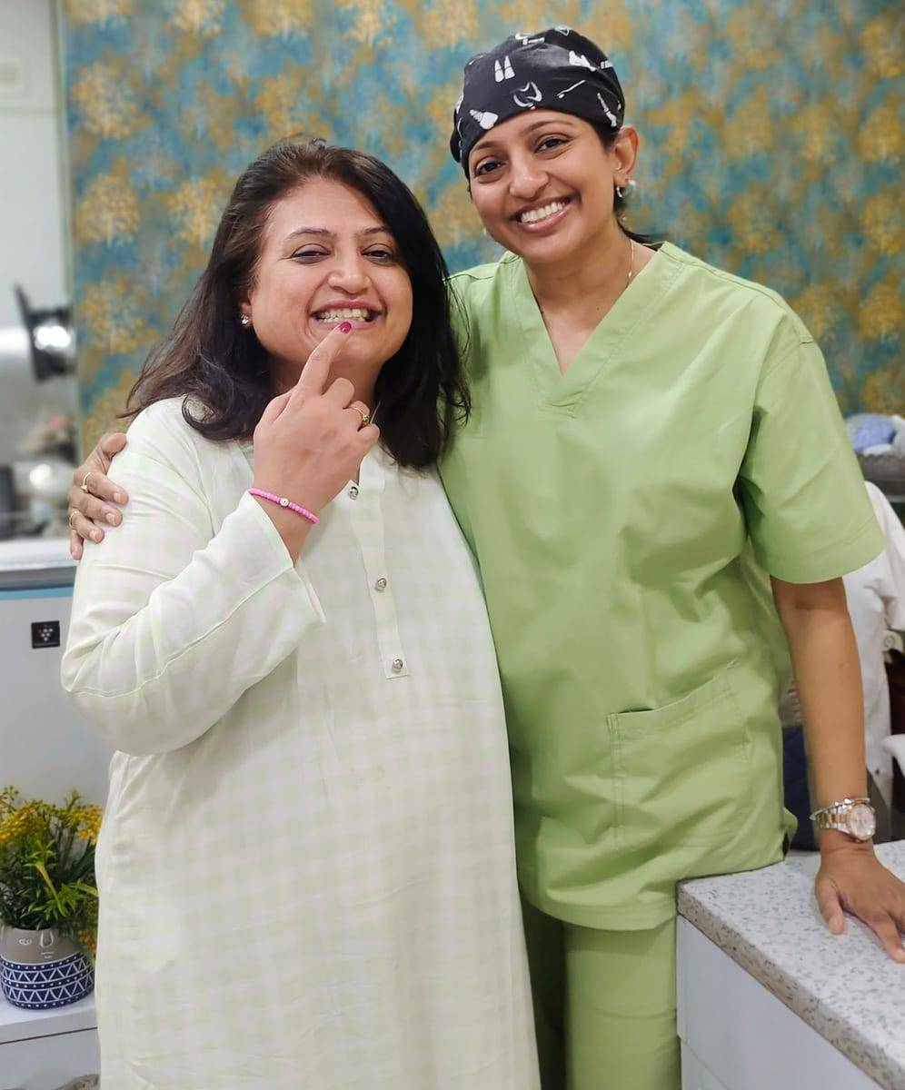 A smiling patient with Dr. Vaishali at Make Me Smile