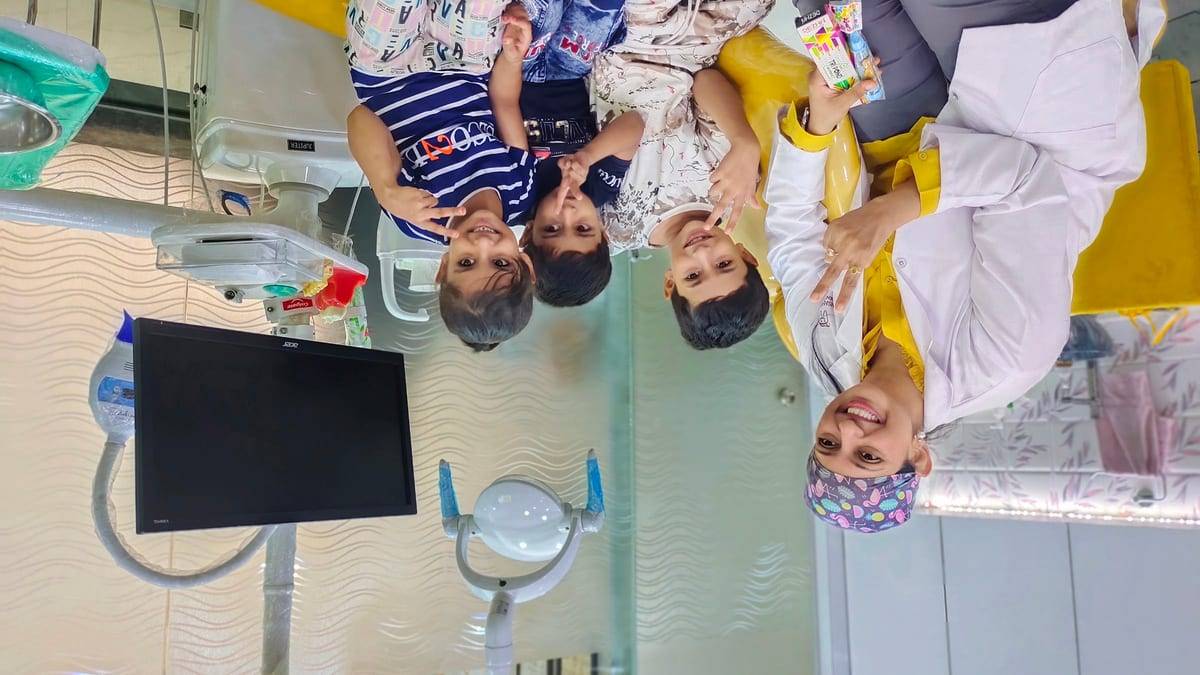 A smiling patient with Dr. Vaishali at Make Me Smile