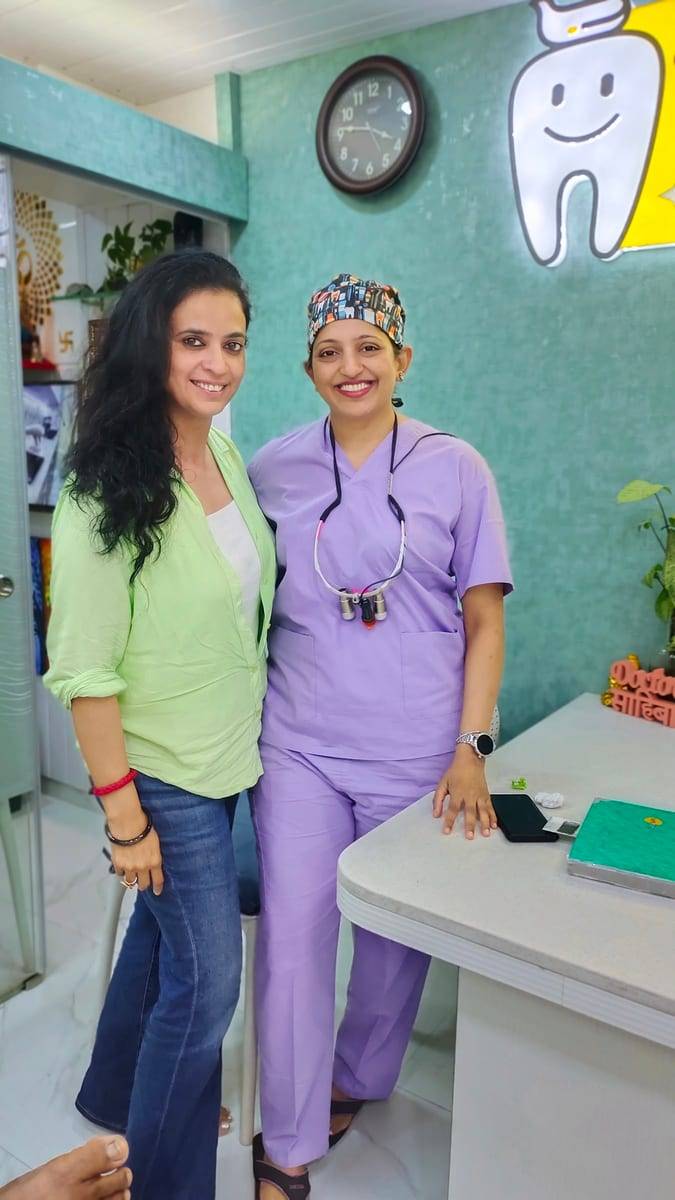 A smiling patient with Dr. Vaishali at Make Me Smile